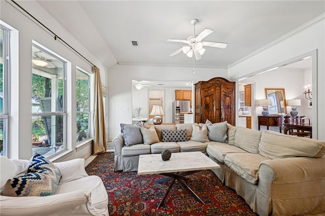 1034 Foy St, Mandeville, LA 70448 - living area with a ceiling fan and ornamental molding