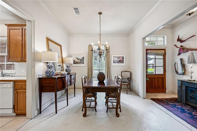 1034 Foy St, Mandeville, LA 70448 - dining room with a chandelier, ornamental molding, and baseboards