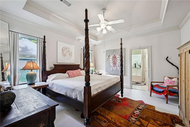1034 Foy St, Mandeville, LA 70448 - bedroom featuring a raised ceiling, ornamental molding, ceiling fan, and ensuite bathroom