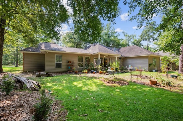 1034 Foy St, Mandeville, LA 70448 - back of property featuring a yard