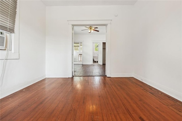 spare room with ceiling fan and hardwood / wood-style flooring