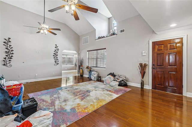 foyer featuring plenty of natural light, lofted ceiling, ceiling fan, and hardwood / wood-style flooring