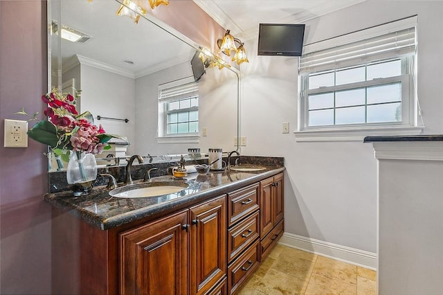 bathroom with vanity and ornamental molding