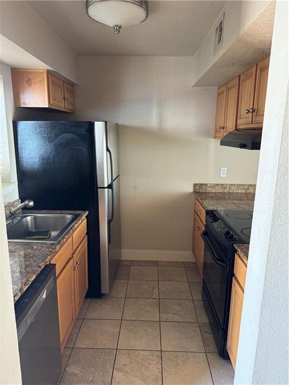 kitchen featuring sink, light tile patterned floors, exhaust hood, and appliances with stainless steel finishes