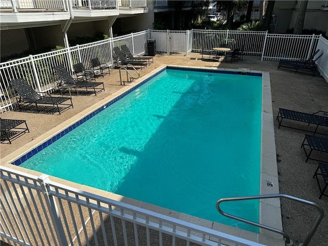 view of pool featuring a patio area