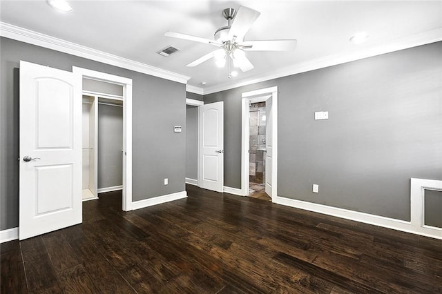 unfurnished bedroom with ceiling fan, wood-type flooring, ornamental molding, and a closet