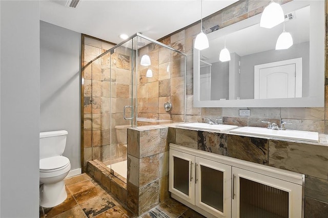 bathroom featuring walk in shower, toilet, and tile patterned floors