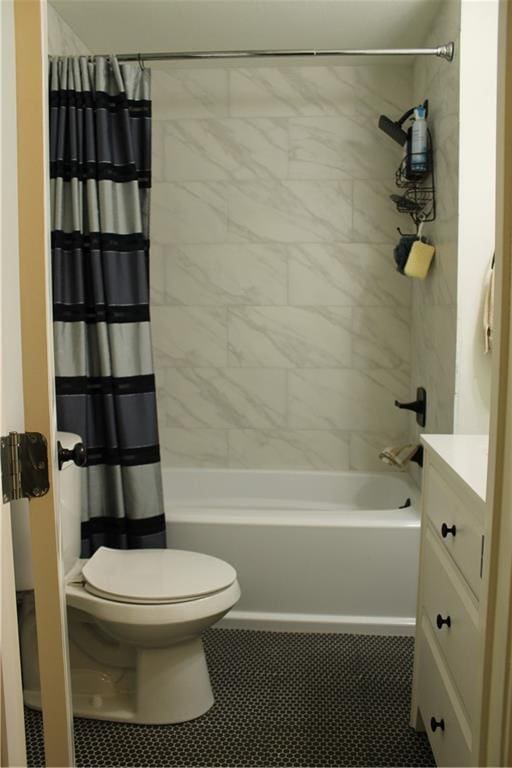 full bathroom with toilet, vanity, and shower / bath combination with curtain