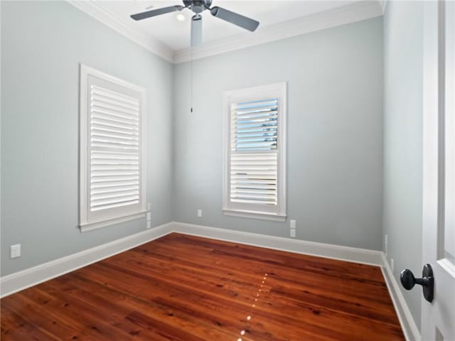 spare room with ceiling fan, ornamental molding, and wood-type flooring