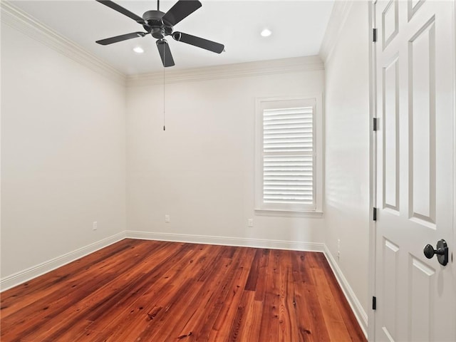 spare room with ceiling fan, wood-type flooring, and crown molding