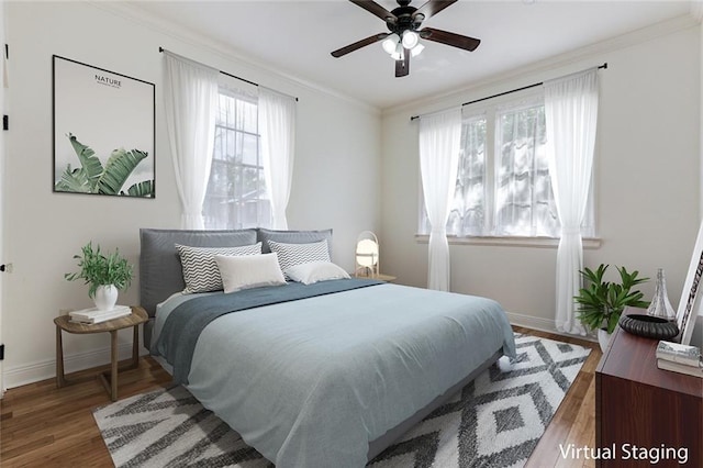 1104 Monroe St, Gretna, LA 70053 - bedroom featuring wood finished floors, crown molding, and a ceiling fan