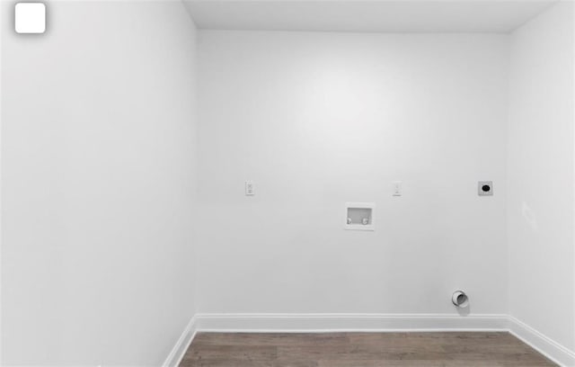 laundry area featuring electric dryer hookup, hookup for a washing machine, and wood-type flooring