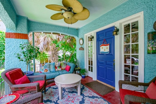 exterior space featuring a porch and ceiling fan