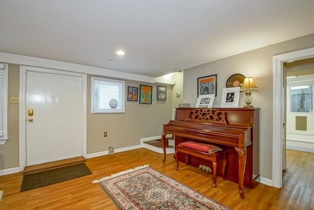 miscellaneous room with light wood-type flooring