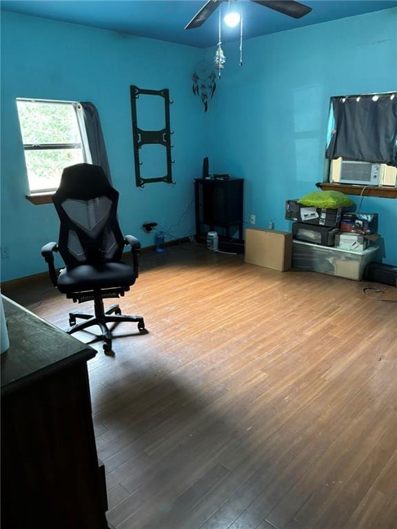 84653 Camus Ln, Covington, LA 70435 - bedroom featuring wood finished floors and a ceiling fan