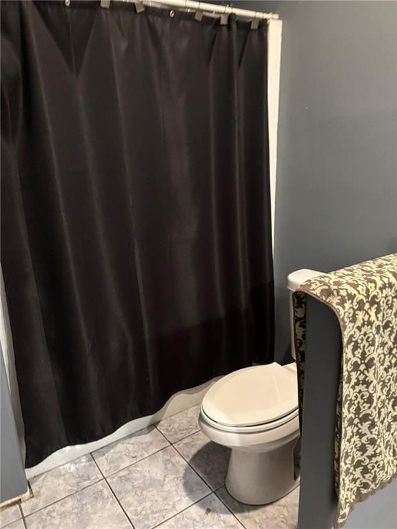 84653 Camus Ln, Covington, LA 70435 - full bath with tile patterned floors and a shower with curtain