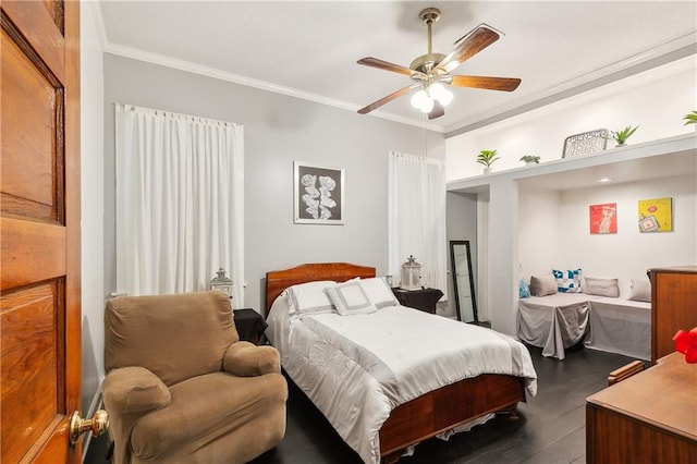 bedroom with ceiling fan, dark wood-type flooring, and crown molding