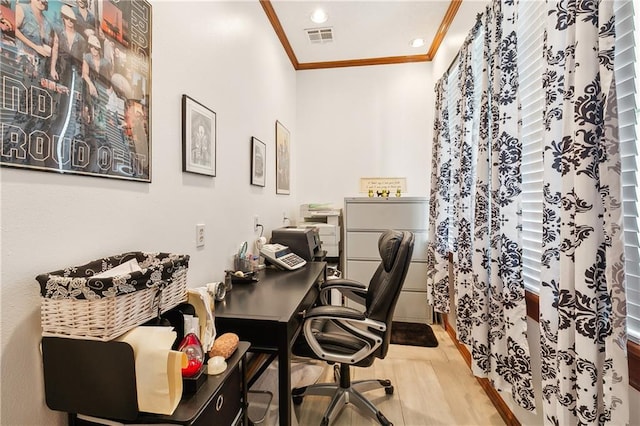 office area featuring hardwood / wood-style floors and ornamental molding