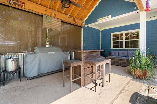 view of patio featuring outdoor lounge area, area for grilling, and ceiling fan