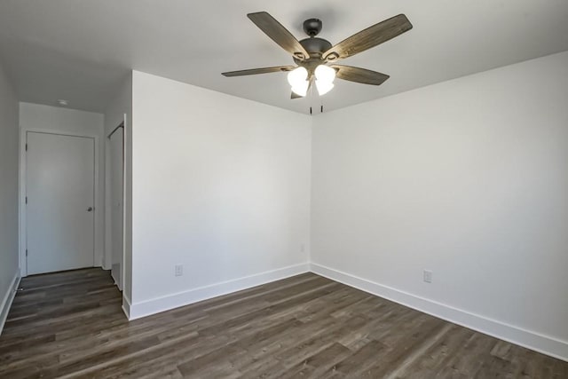 unfurnished room featuring ceiling fan and dark hardwood / wood-style floors