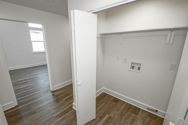 laundry room featuring hookup for a washing machine and dark hardwood / wood-style floors