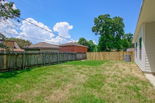 view of yard featuring central AC unit