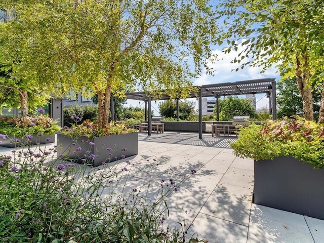 surrounding community featuring a pergola and a patio