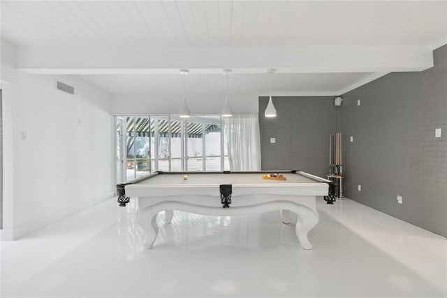 game room with beamed ceiling, billiards, and concrete floors