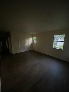 unfurnished room featuring wood-type flooring