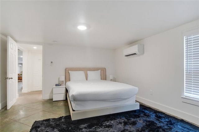 tiled bedroom with a wall unit AC, multiple windows, and baseboards