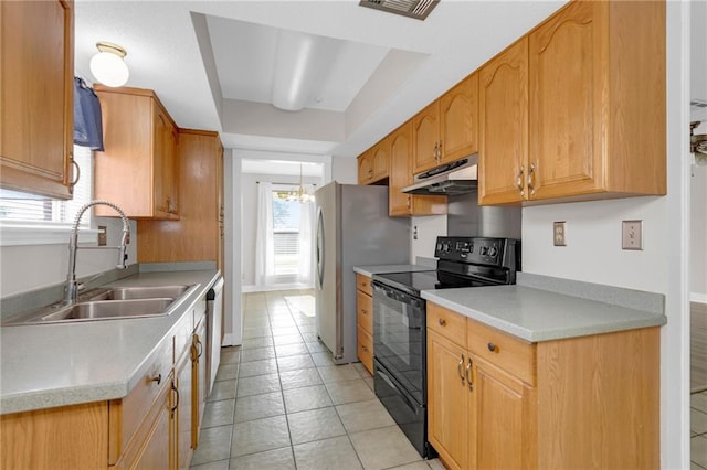 kitchen featuring light tile patterned flooring, sink, black electric range oven, and an inviting chandelier