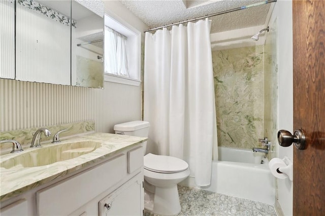 full bathroom with shower / bath combination with curtain, vanity, toilet, and a textured ceiling