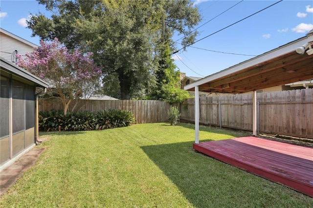 view of yard featuring a deck