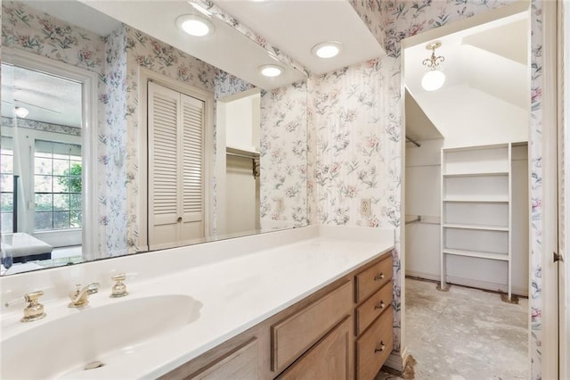 bathroom with tile patterned floors and vanity