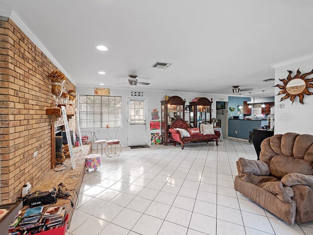 living room featuring ceiling fan, light tile patterned flooring, and brick wall