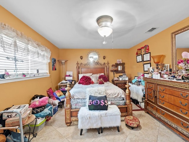 bedroom featuring ceiling fan and light tile patterned flooring