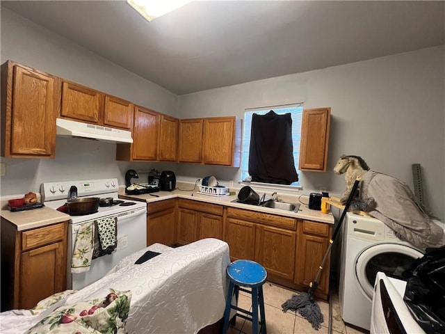 kitchen featuring washer / clothes dryer, light tile patterned floors, sink, and white range with electric stovetop