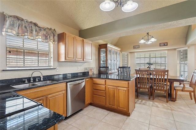 kitchen featuring a textured ceiling, lofted ceiling, dishwasher, a notable chandelier, and sink