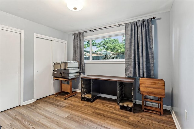 interior space with hardwood / wood-style floors