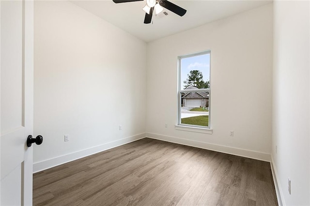 empty room featuring ceiling fan and wood-type flooring