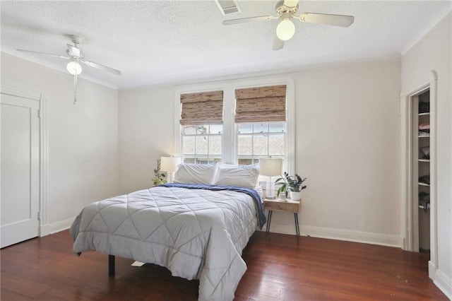 3722 Nashville Ave, New Orleans, LA 70125 - bedroom featuring wood finished floors, visible vents, a ceiling fan, baseboards, and a textured ceiling