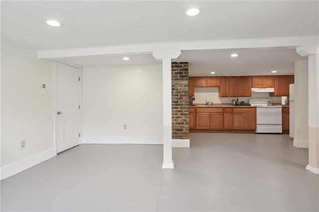 3722 Nashville Ave, New Orleans, LA 70125 - unfurnished living room featuring recessed lighting, baseboards, and a sink