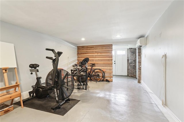 3722 Nashville Ave, New Orleans, LA 70125 - exercise room featuring baseboards, recessed lighting, and a wall unit AC