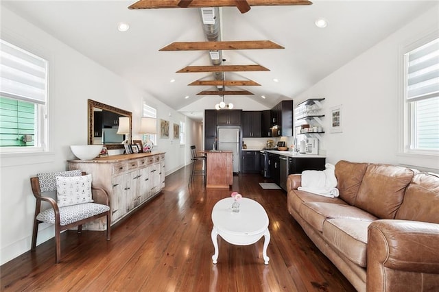 living area with lofted ceiling with beams, a healthy amount of sunlight, dark wood finished floors, and recessed lighting