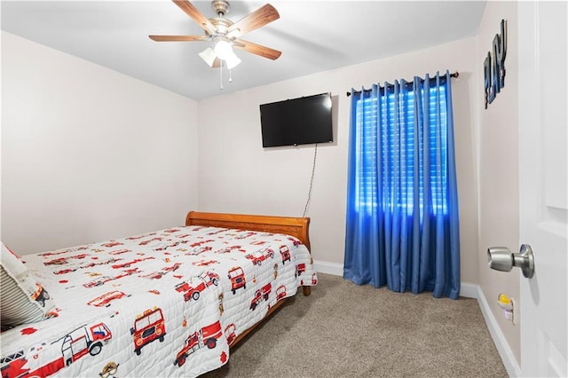 bedroom featuring ceiling fan and carpet floors