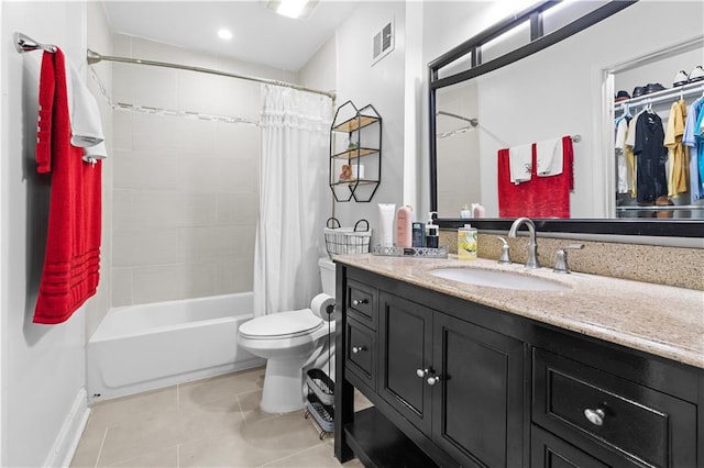 full bathroom with tile patterned floors, vanity, shower / bath combination with curtain, and toilet