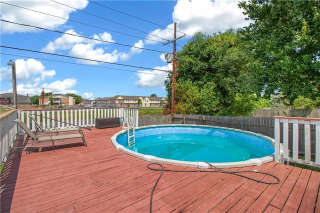 view of pool featuring a wooden deck