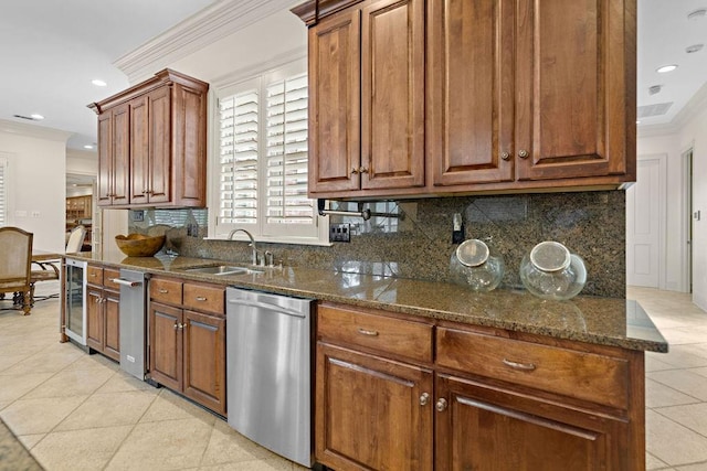 kitchen with sink, stainless steel dishwasher, tasteful backsplash, light tile patterned floors, and crown molding