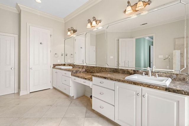 bathroom with ornamental molding, double vanity, and tile patterned floors