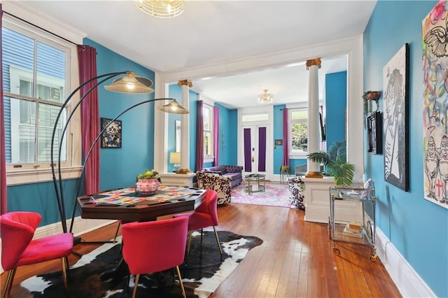 dining space featuring french doors and hardwood / wood-style flooring